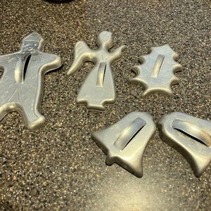 5 Vintage aluminum cookie cutters. Clown, Angel, Holly Leaf and 2 Bells.